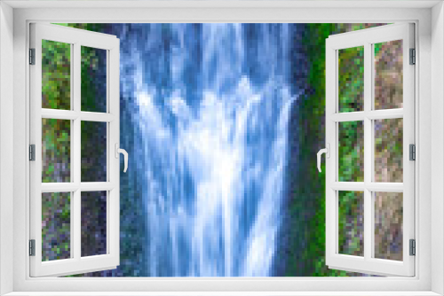 Fototapeta Naklejka Na Ścianę Okno 3D - Multnomah Falls is a waterfall located on Multnomah Creek in the