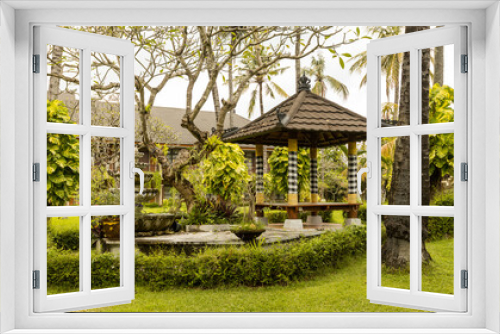 Fototapeta Naklejka Na Ścianę Okno 3D - Beautiful garden in Legian beach villa, green lush garden in Bali, Indonesia