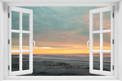 Fototapeta Naklejka Na Ścianę Okno 3D - Colorful orange dawn sky, beach, sunrise, ocean, waves, Hunting Island, South Carolina coast