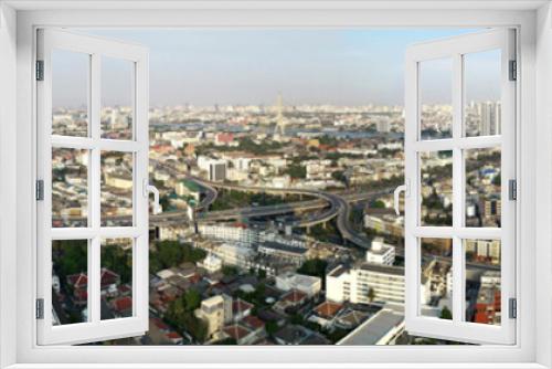 Fototapeta Naklejka Na Ścianę Okno 3D - Aerial view panorama of Thonburi district in Bangkok city and sunset sky and clouds in Bangkok Thailand