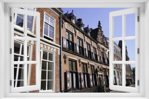 Fototapeta Naklejka Na Ścianę Okno 3D - Old, historical houses of Utrecht - Holland, taken during a canal cruise through the city.