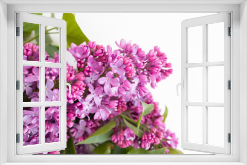 Fototapeta Naklejka Na Ścianę Okno 3D - Fresh branches of purple lilac blossoms on white table background. Pastel color. Empty place for inspirational, happy text, lovely quote or positive sayings. Flat lay. Top down view. Closeup.