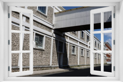 Fototapeta Naklejka Na Ścianę Okno 3D - Anciennes usines et ancien siège de l'entreprise Leroy Somer, devenue Nidec, vue de l'extérieur, ville de Angoulême, département de la Charente, France