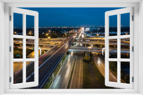 Fototapeta Naklejka Na Ścianę Okno 3D - Aerial top view road traffic interchange in city, Aerial view of highway and overpass in city, Expressway top view, Road traffic an important infrastructure, Ecology.