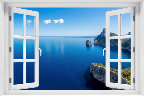Fototapeta Naklejka Na Ścianę Okno 3D - Panoramic view of beautiful Mediterranean seascape. Scenic Rocky cliffs on seaside against sky. Idyllic blue ocean at island in summer.