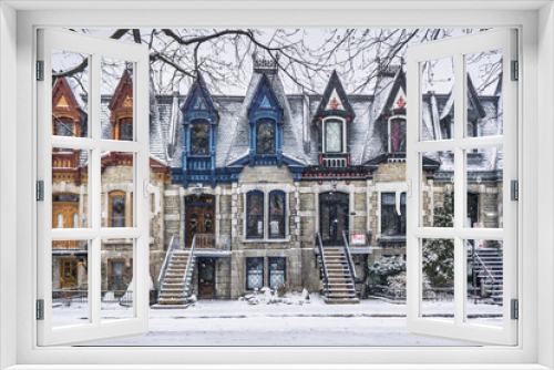 Fototapeta Naklejka Na Ścianę Okno 3D - View on Carré Saint Louis colorful victorian houses on a snowfall day in Montreal, Quebec (Canada)