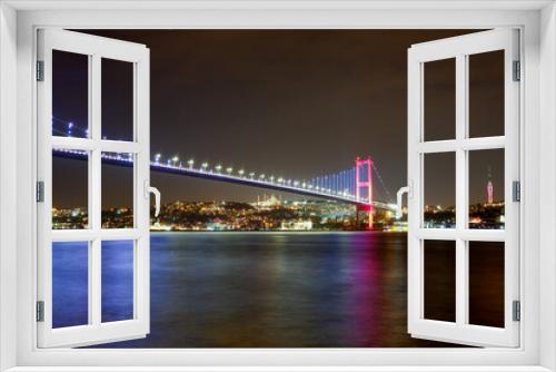 Stunning views of Istanbul cityscape over Bosphorus at night.