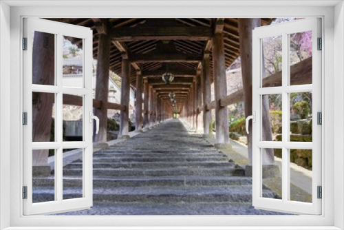 Fototapeta Naklejka Na Ścianę Okno 3D - 満開の桜の花に囲まれた寺院の石段の情景＠奈良