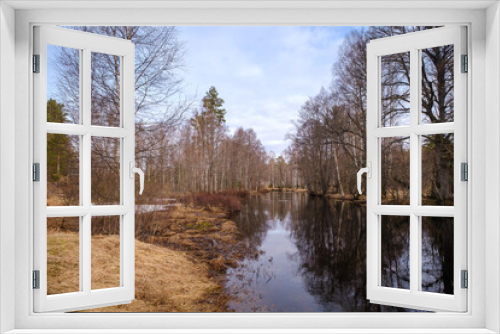 Fototapeta Naklejka Na Ścianę Okno 3D - Early spring view on a Stångån river in Sweden