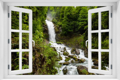 Fototapeta Naklejka Na Ścianę Okno 3D - Beautifull large waterfall in the Swiss Alps. Sunny summer day, green nature, no people