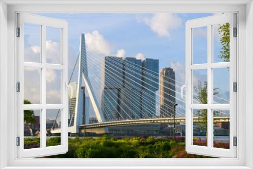 Fototapeta Naklejka Na Ścianę Okno 3D - Erasmus Bridge in Rotterdam over Nieuwe Maas river during a beautiful morning sunrise. Architecture landmark of the Netherlands, Holland.