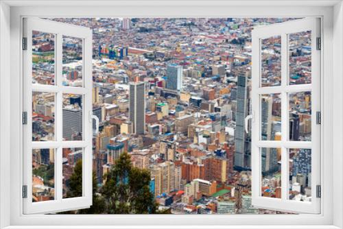 Fototapeta Naklejka Na Ścianę Okno 3D - Vista de la ciudad de Bogotá- Colombia desde el monasterio de Monserrate, edificios, metrópoli.