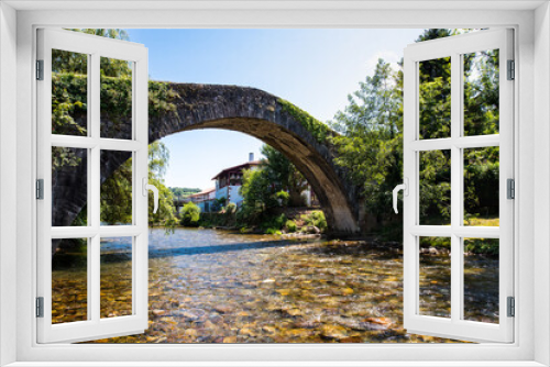 Fototapeta Naklejka Na Ścianę Okno 3D -  Ancient bridge over the River Nive at St Etienne de Baïgorry, French Pyrénées.