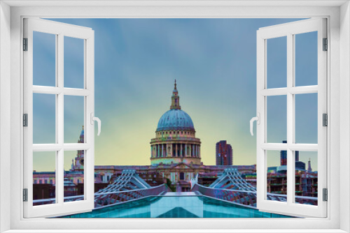 Fototapeta Naklejka Na Ścianę Okno 3D - Millenium bridge and St Paul cathedral dome at London-UK, taken on May 22, 2022.