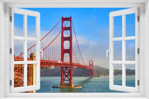Fototapeta Naklejka Na Ścianę Okno 3D - Red Golden Gate Bridge in California during vibrant foggy morning