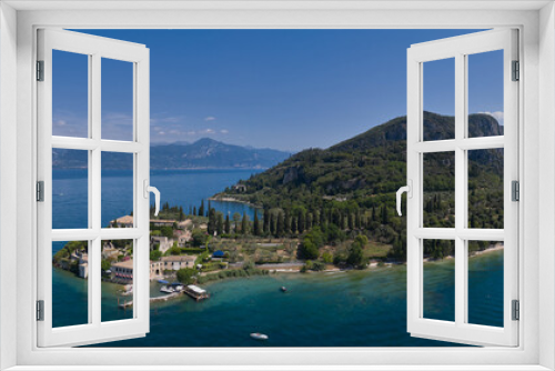 Fototapeta Naklejka Na Ścianę Okno 3D - Aerial panorama of Parco San Vigilio, Lake Garda, Italy. Aerial view of Punta San Vigilio, Garda. Top view of Baia delle Sirene Park.
