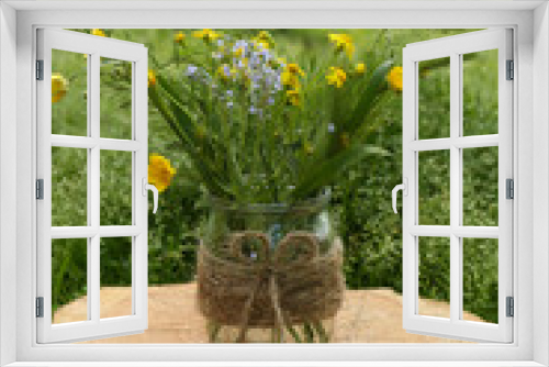Fototapeta Naklejka Na Ścianę Okno 3D - Bouquet of beautiful wildflowers in glass vase on wooden stump outdoors
