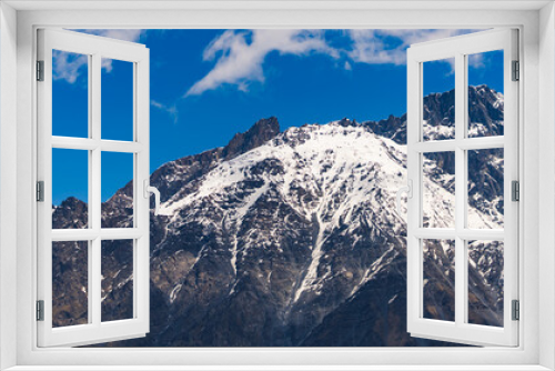 Fototapeta Naklejka Na Ścianę Okno 3D - panorama of beautiful and snowy Caucasus mountains in the sunny weather, Kazbegi, Georgia. High quality photo
