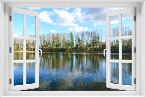 Fototapeta Naklejka Na Ścianę Okno 3D - spring landscape with reflections of lakes, clouds and trees on a calm water surface