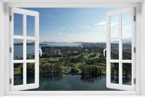 Fototapeta Naklejka Na Ścianę Okno 3D - Kota Kinabalu, Sabah Malaysia – June 15, 2022: The Tanjung Aru Beach, Fisherman Village and Shangri-La Hotel