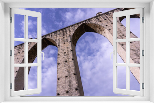 Fototapeta Naklejka Na Ścianę Okno 3D - Lisbon aqueduct against a clear blue sky