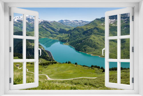 Fototapeta Naklejka Na Ścianę Okno 3D - View of Roselend lake and dam near Arêche Beaufort in the Alps - Vue du lac et du barrage de roselend proche d'Arêche Beaufort dans les Alpes