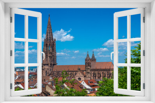 View over the roofs of the old town with Freiburg Cathedral, Freiburg im Breisgau, Baden-Wuerttemberg, Germany