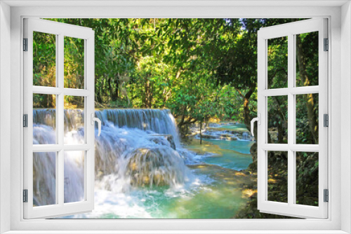 Fototapeta Naklejka Na Ścianę Okno 3D - Beautiful secluded lonely tropical waterfall landscape, green jungle forest, rock cascade, blue turquoise river  - Kuang Si, Luang Prabang, Laos