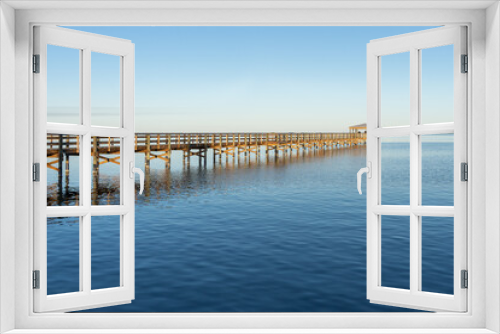 Fototapeta Naklejka Na Ścianę Okno 3D - Rotary Riverfront Park lookout deck in Titusville, Florida, USA. Rotary Riverfront Park is located along the Indian River Lagoon with a view of  the rocket launch pads.