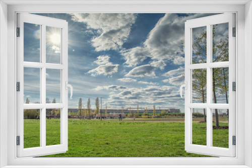 Fototapeta Naklejka Na Ścianę Okno 3D - beautiful view in the park, blue sky with clouds, summer sunny day in nature, Ingolstadt