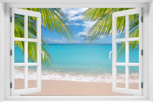 Fototapeta Naklejka Na Ścianę Okno 3D - Palm branches in front of blurred sea. Tropical travel background.