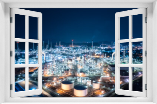 Fototapeta Naklejka Na Ścianę Okno 3D - blurred image of oil refinery plant at twilight