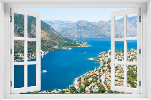 Fototapeta Naklejka Na Ścianę Okno 3D - Beautiful seascape overlooking the blue sea, mountains and the old town. City of Kotor, Montenegro. Selective focus.