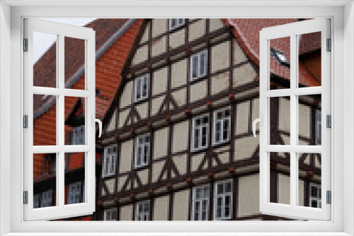 Fototapeta Naklejka Na Ścianę Okno 3D - An old German building. The traditional design of the facade of the house of Central Europe of the past centuries
