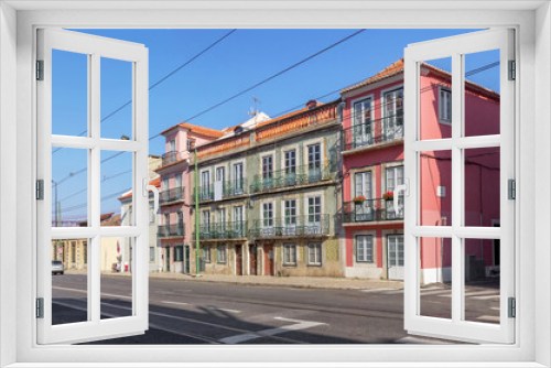 Fototapeta Naklejka Na Ścianę Okno 3D - Old beautiful houses with balconies on Rua da Junqueira or Junqueira street. Lisbon, Portugal