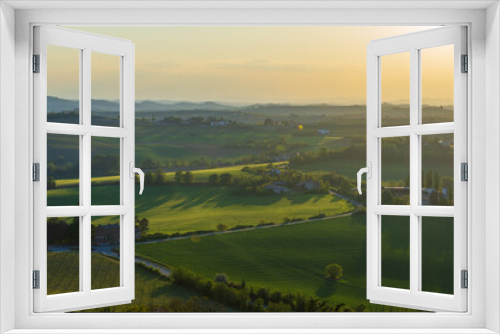 Fototapeta Naklejka Na Ścianę Okno 3D - Landscape of the hills of Monferrato in Piedmont in Northern Italy at sunset time golden hour