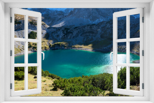 Fototapeta Naklejka Na Ścianę Okno 3D - closeup of blue-green lake Drachensee, hiking destination Ehrwald