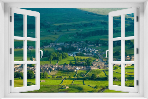 Fototapeta Naklejka Na Ścianę Okno 3D - An Aerial view of Hawes a market town and civil parish in the Richmondshire district of North Yorkshire, England, at the head of Wensleydale in the Yorkshire Dales