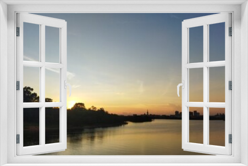 Fototapeta Naklejka Na Ścianę Okno 3D - sunset over the lake 