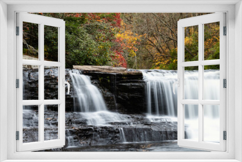 Fototapeta Naklejka Na Ścianę Okno 3D - Refreshing Waterfall Hidden Deep in the Autumn Forest