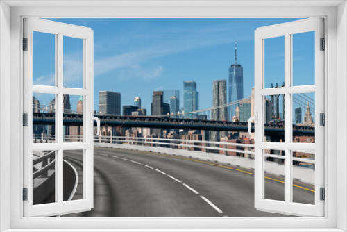 Fototapeta Naklejka Na Ścianę Okno 3D - Empty urban asphalt road exterior with city buildings background. New modern highway concrete construction. Concept of way to success. Transportation logistic industry fast delivery. New York. USA.