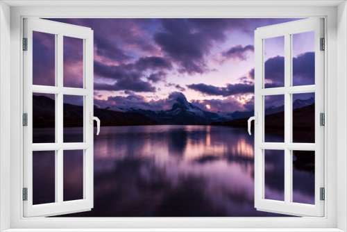 Fototapeta Naklejka Na Ścianę Okno 3D - Beautiful sunset colors and cloudscape in the Swiss Alps in summer, with Matterhorn reflection in a lake