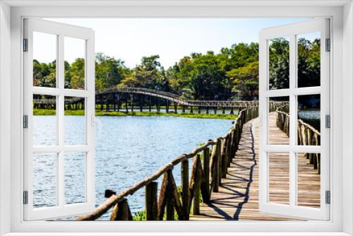 Fototapeta Naklejka Na Ścianę Okno 3D - Nong Yai Pond and Wooden Bridge in Chumphon, Thailand
