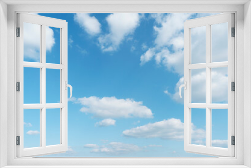 Beautiful clouds during spring time in a Sunny day. Blue sky and white fluffy clouds