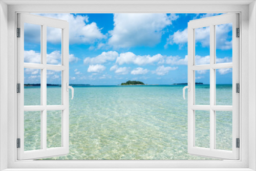 Fototapeta Naklejka Na Ścianę Okno 3D - Nature seascape view of beautiful tropical beach and sea in sunny day with some clouds and islands in the horizon. Belitung, Indonesia