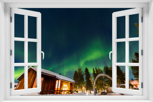 Fototapeta Naklejka Na Ścianę Okno 3D - Northern Lights in Lapland. in Abisko in Sweden. Colors in the sky and in the snow