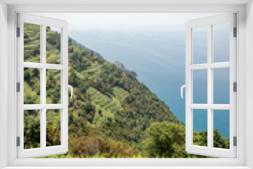 Fototapeta Naklejka Na Ścianę Okno 3D - Beautiful view of Paradise. Cinque Terre in Italy. Mediterranean Sea and vinery in the foreground