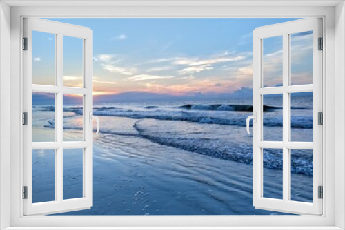 Fototapeta Naklejka Na Ścianę Okno 3D - Beach Ocean Sunrise Over Rippling Stacked Waves
