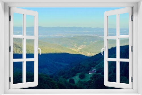 Beautiful mountain landscape in the Florival valley above Guebwiller, with the plain of Alsace, seen from the top on a sunny summer day