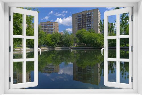 Fototapeta Naklejka Na Ścianę Okno 3D - City pond on a sunny summer day.